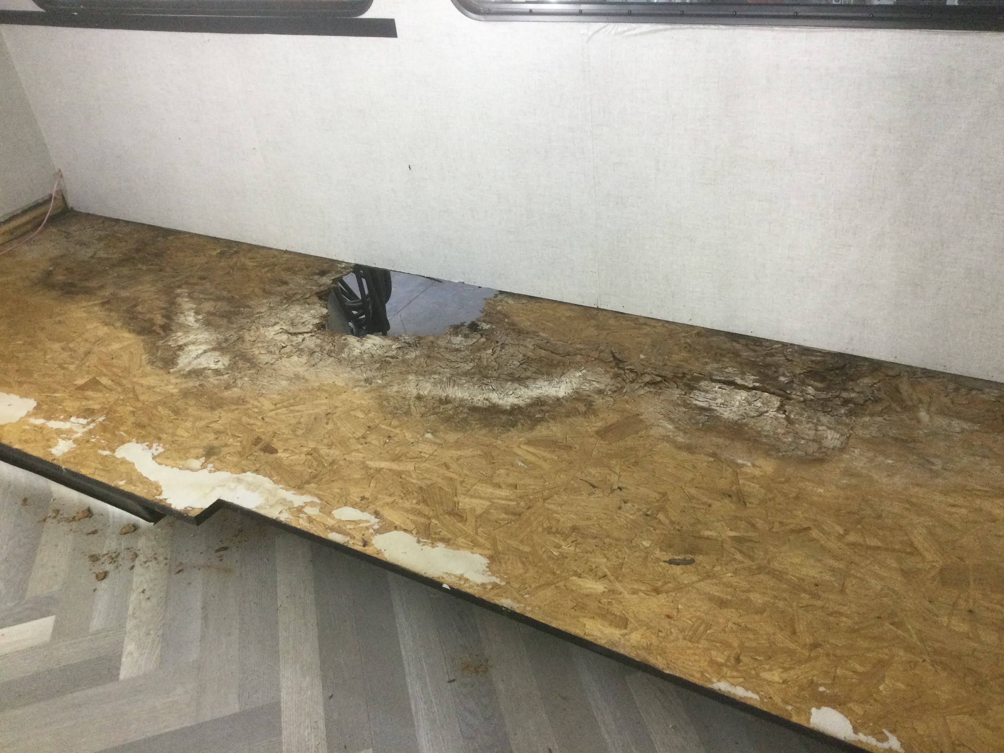 Damaged slide subfloor